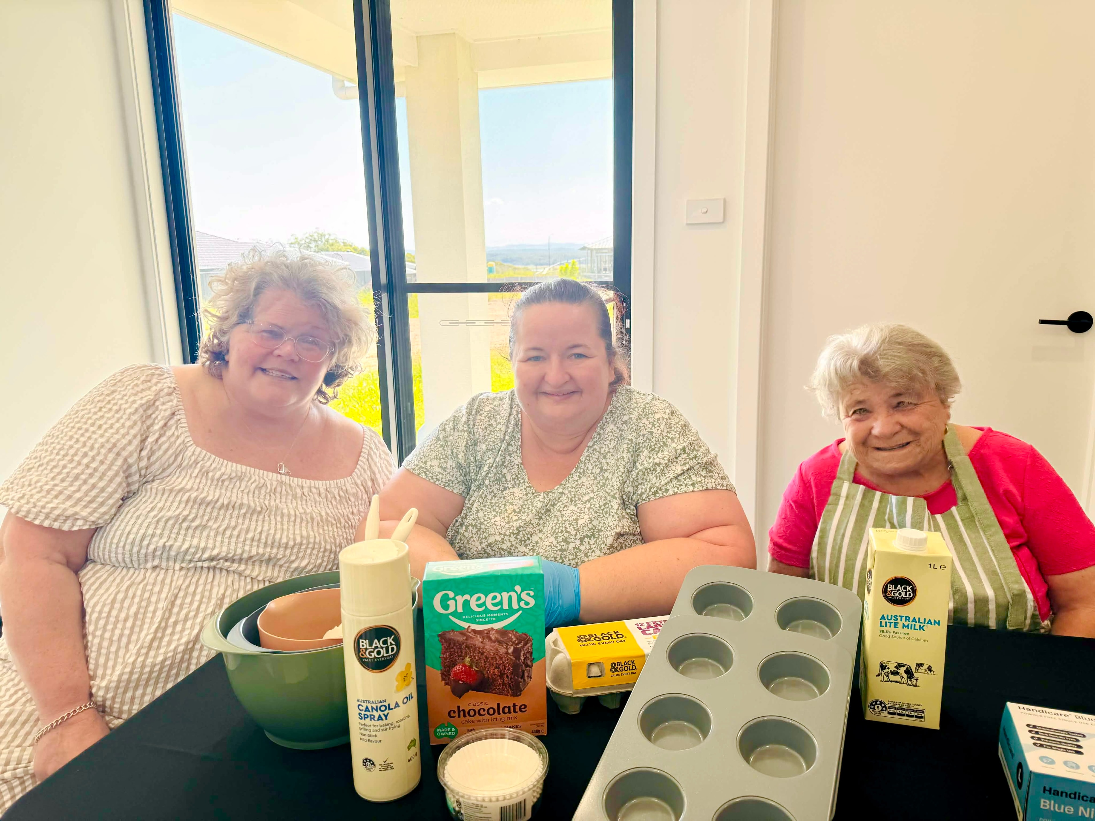Skills Hub participants baking together at the Eat Well program